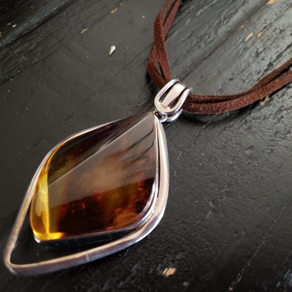 New Large Amber Pendant In Silver Setting